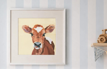 Cute cow art print in a farm themed nursery