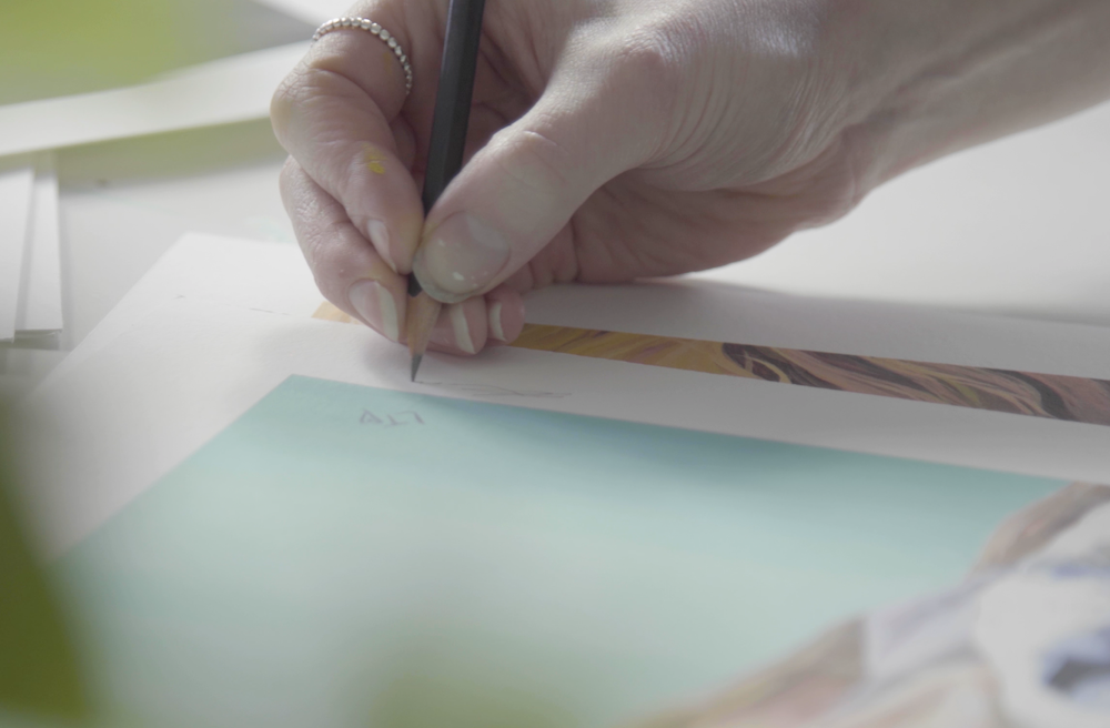 Lauren Terry signing a limited edition print